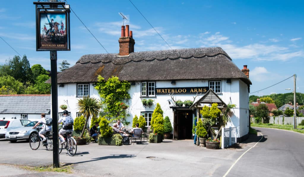 The Best Pub Guide - Nestled in a stunning UK National Park, this charming whitewashed pub with its classic thatched roof offers the perfect countryside escape. Take a seat outside and soak up the views—walkers, cyclists, and locals all mingle here after a day exploring the great outdoors. Whether you’re out for a scenic walk or simply fancy relaxing with friends (four-legged ones included), it’s an ideal spot to unwind and enjoy some true British hospitality. Cheers to stunning scenery, delicious pints, and dog-friendly vibes!. | Pub Directory UK